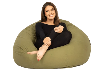 girl sitting on olive cotton beanbag
